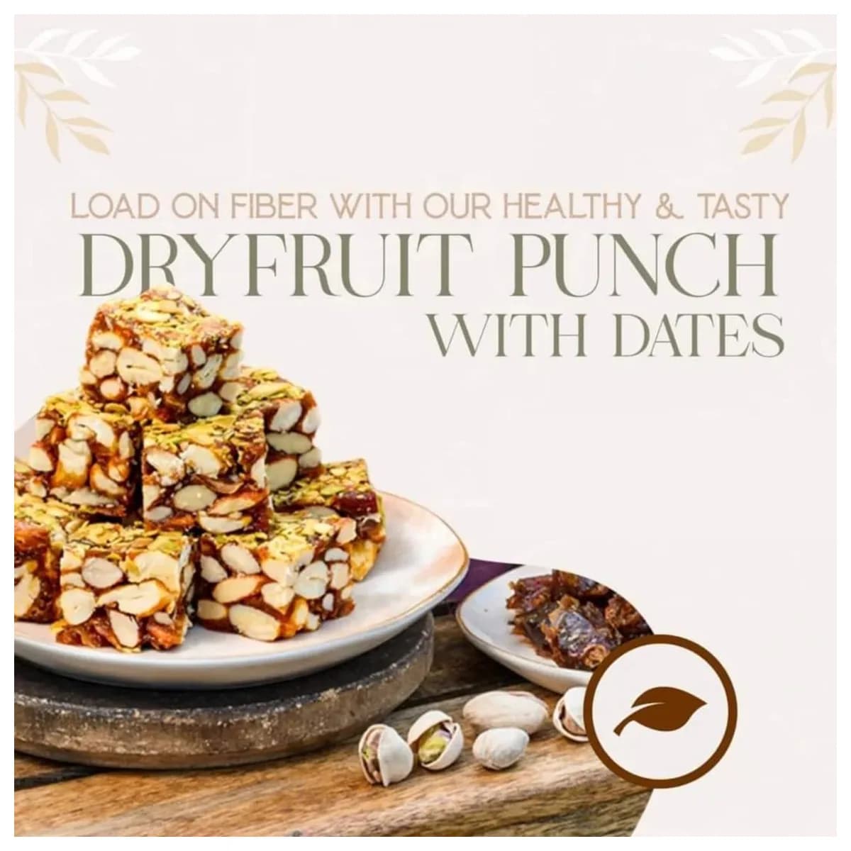 Premium Desi Ghee Dryfruit Punch with Dates — squares packed with almonds, cashews and pistachio, served on a plate